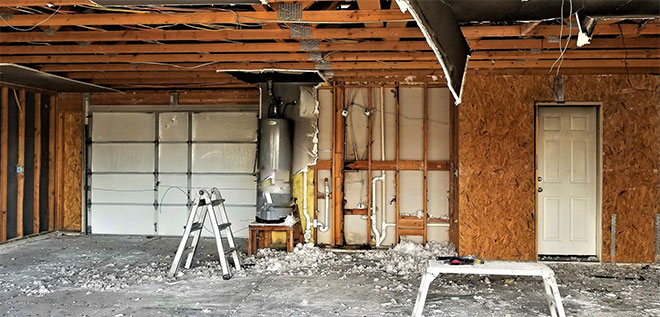 fire damage restoration in a garage after a water heater fire