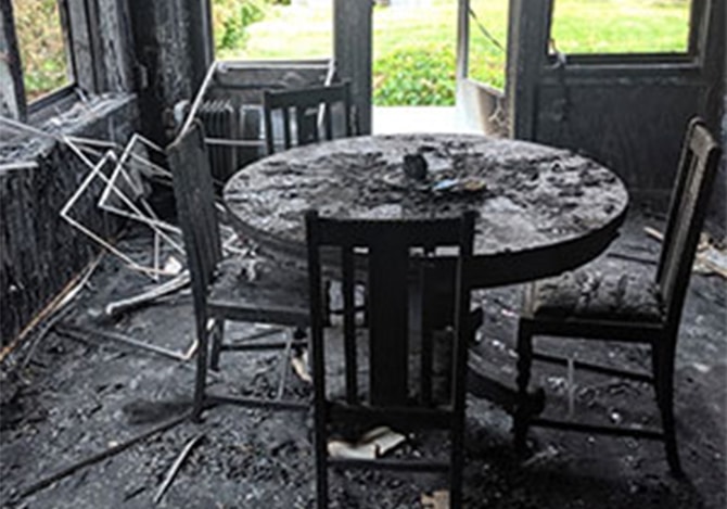 Boise house fire burnt table chairs and burned out kitchen