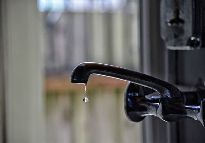 dripping faucet that could lead to water damage in a house