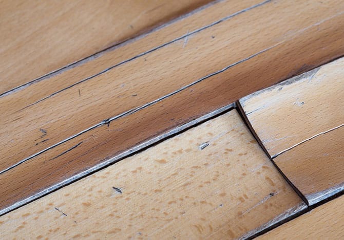 Hardwood floors buckling from water damage