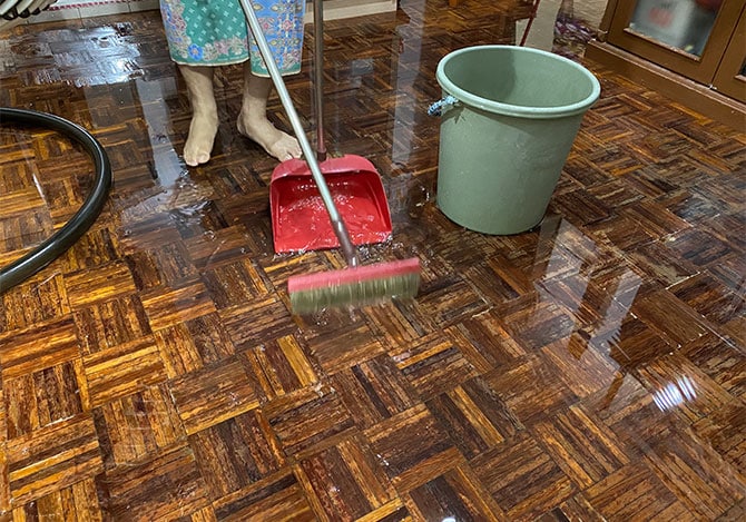 home floor covered with water