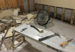under-construction-tools-drywall-water-damage-property-damage